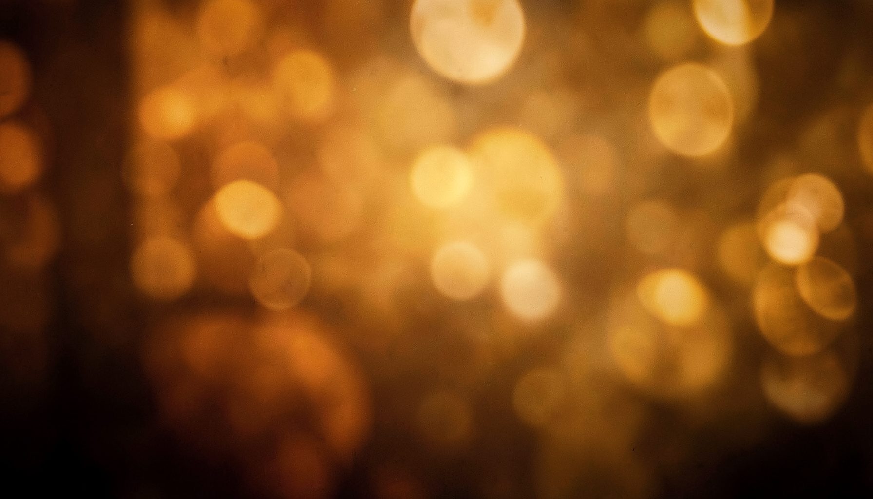 Warm, atmospheric wide banner in deep amber and soft gold tones, evoking the emotional drama of a Hindi television serial